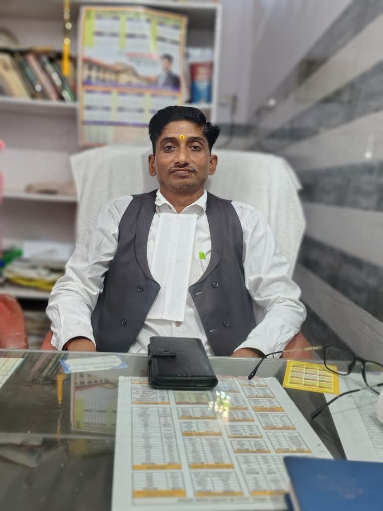 Portrait of Advocate Anil Kumar Gupta in advocate chamber robes